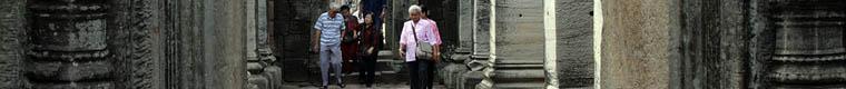 people walking through Phimai Khmer temple ruin