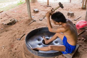 man making a gong