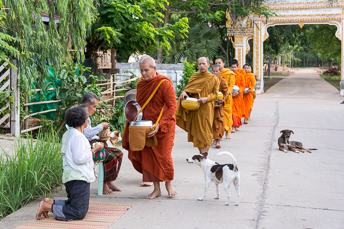 monks collecting alms