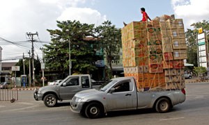 pickup truck carrying dozens of boxes